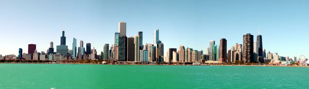 A panoramic photograph of the Chicago skyline across Lake Michigan.